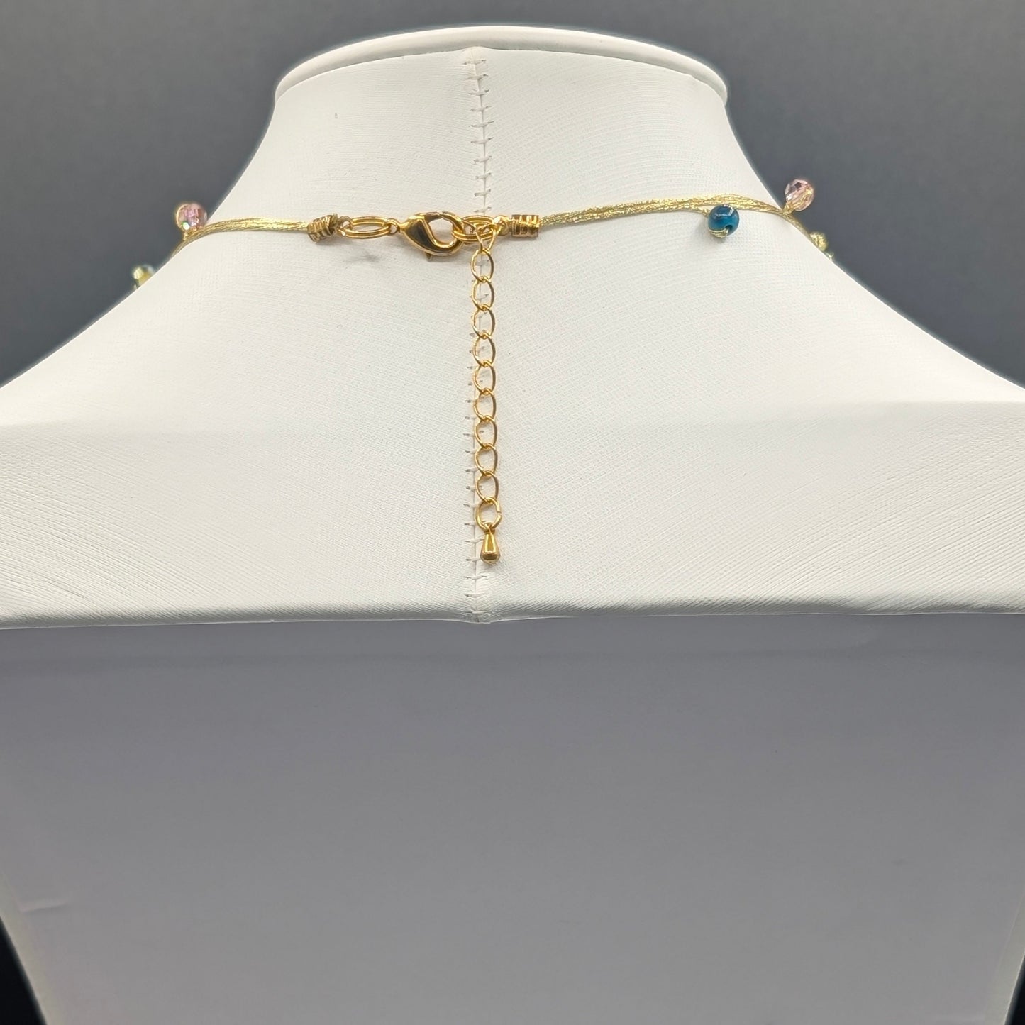 Celestial Twist: Knotted Silk Torsade Necklace with Twilight Sparkle