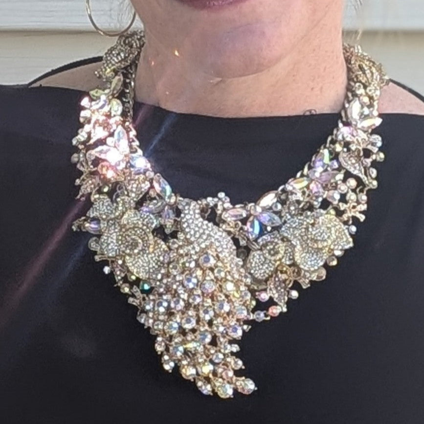 Shimmer Strut: Big Ass Sparkle Rhinestone Peacock Breastshield Statement Necklace